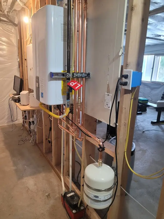 Licensed plumber repairing a kitchen sink in Terrell